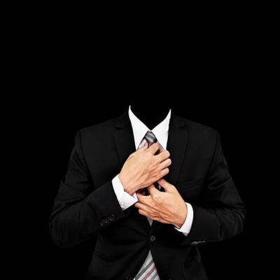 Headless businessman in black suit, with copy space